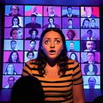 Interactive Online Theatre Performance**

Prompt: "A vibrant, immersive online theatre performance. Show diverse audience members engaging via interactive screens, influencing the plot with real-time votes and choices. Emphasize the sense of community and unique, unrepeatable experience, with creative digital projections and dynamic lighting."

**